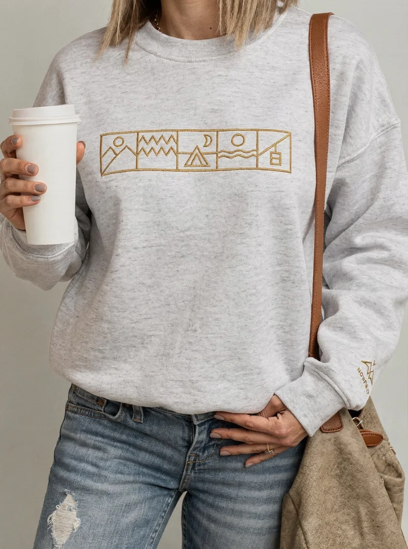 Modèle portant le sweat Lifestyle Outdoor Heather Grey de NOWFIELD, vue de face.